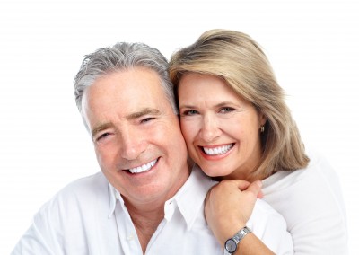 a man and woman smiling