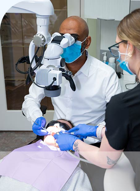 a dentist working on a patient