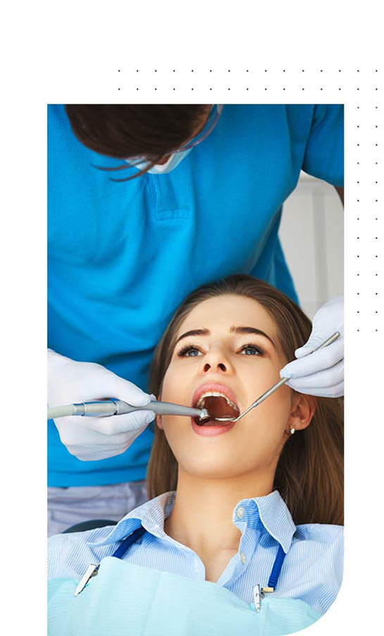 a woman getting her teeth checked
