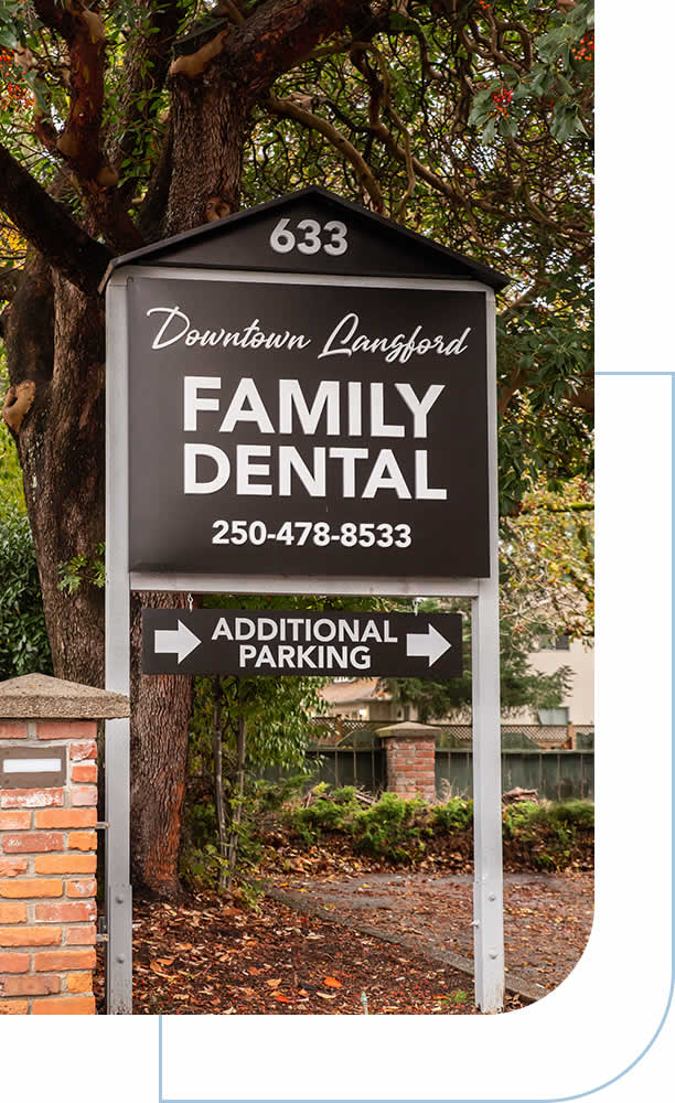 a sign with a couple of white text